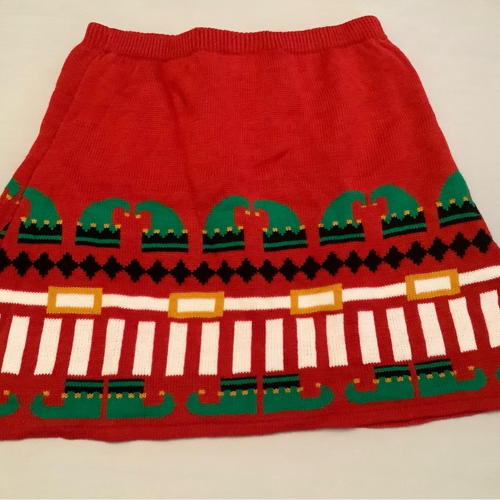 Size Large Christmas elf sweater knit pull on skirt. Like new condition